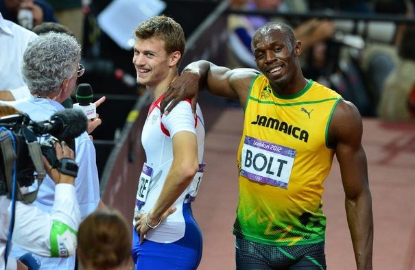 Christophe Lemaitre et Usain Bolt après les demi finales du 200 m